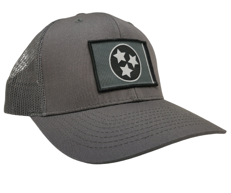 The three stars represent the three grand divisions of Tennessee: West, Middle and East. “They are arranged in such a way that not one star has prominence over the other. Sport your Tennessee support with our grey mesh cap featuring the iconic Tennessee Tri Star flag logo. Shop now at our Smyrna, TN store or online. Snap back adjustment.