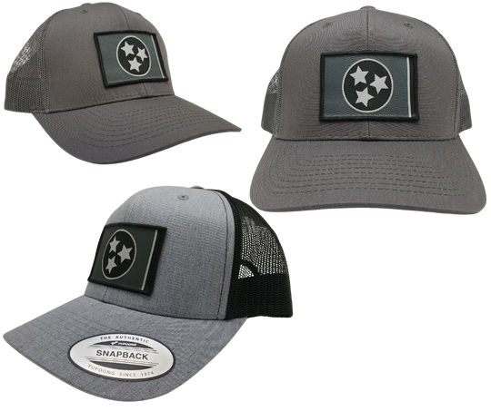 The three stars represent the three grand divisions of Tennessee: West, Middle and East. “They are arranged in such a way that not one star has prominence over the other. Sport your Tennessee support with our grey mesh cap featuring the iconic Tennessee Tri Star flag logo. Shop now at our Smyrna, TN store or online. Snap back adjustment.