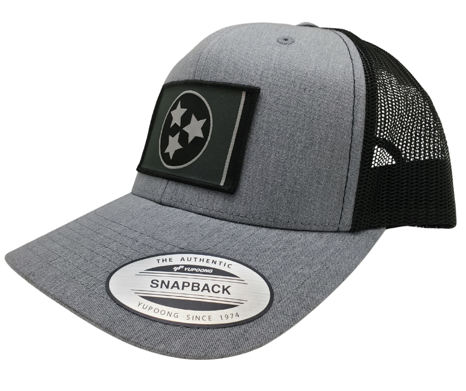 The three stars represent the three grand divisions of Tennessee: West, Middle and East. “They are arranged in such a way that not one star has prominence over the other. Sport your Tennessee support with our grey mesh cap featuring the iconic Tennessee Tri Star flag logo. Shop now at our Smyrna, TN store or online. Snap back adjustment.