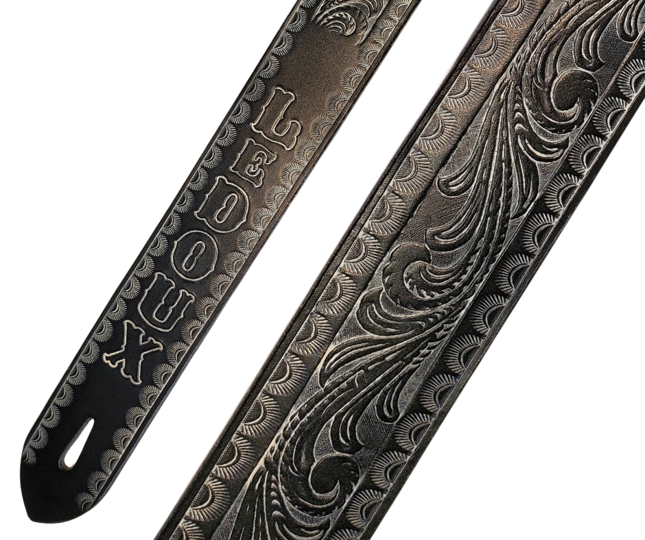 Great Musicians, Singers and great songs have been a staple for years in Nashville. Be on your way starting your journey with this 2" or 2 1/2" main Body of the Guitar strap. It is approx. 1/8" thick Cowhide with a CUSTOMIZABLE NAME FONT. The classic adjustment style goes from approx. 42" to 56" at it's longest . Made just outside Nashville in our Smyrna, TN. shop.