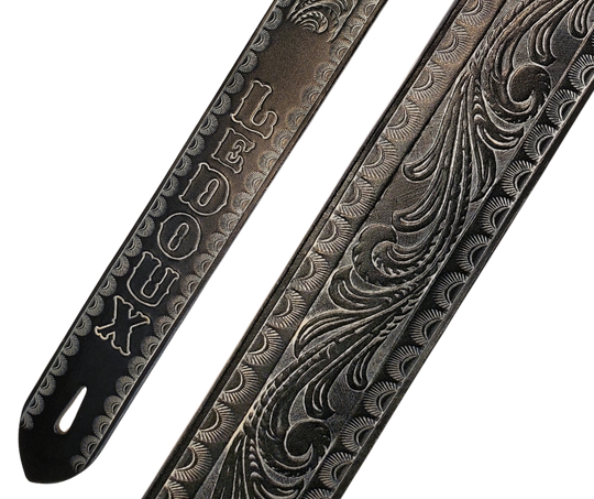 Great Musicians, Singers and great songs have been a staple for years in Nashville. Be on your way starting your journey with this 2" or 2 1/2" main Body of the Guitar strap. It is approx. 1/8" thick Cowhide with a CUSTOMIZABLE NAME FONT. The classic adjustment style goes from approx. 42" to 56" at it's longest . Made just outside Nashville in our Smyrna, TN. shop.