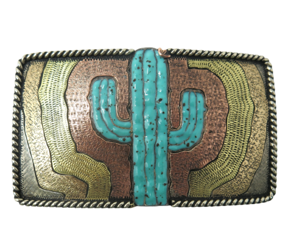 The El Cacto buckle is made from German Silver (nickel and brass alloy) or iron metal base. Each piece is punched, cut, soldered, engraved, polished and painted by our talented metal workers.&nbsp; Our products are all&nbsp; In order to give you the quality and long lasting final product we also&nbsp; Available at our Smyrna, TN shop just outside of Nashville. Approx. Width 4” Height 3”