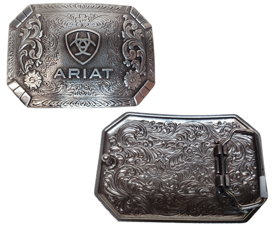 This rectangular buckle features rounded edges and a centered Ariat logo. The surface also boasts charming Western scroll and floral designs. The antique silver finish adds a touch of nostalgia. With a height of 2 1/2" and width of 3 1/2", it accommodates belts up to 2" wide. Purchase it on our online store or at our retail shop in Smyrna, TN, near Nashville. Imported