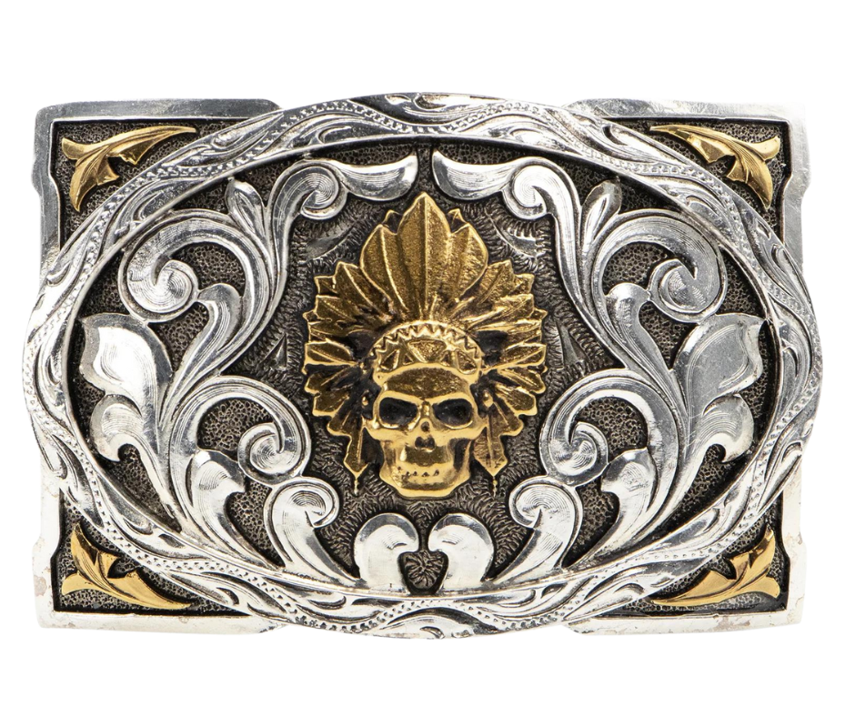 This belt buckle blends Indian symbolism and classic Western scrollwork in antique silver and gold plating, giving it a timeless appeal. With a height of 2 5/8" and width of 4", it fits belts up to 1 1/2" wide and is available for purchase online or at our Smyrna, TN shop near Nashville. Made in Mexico.