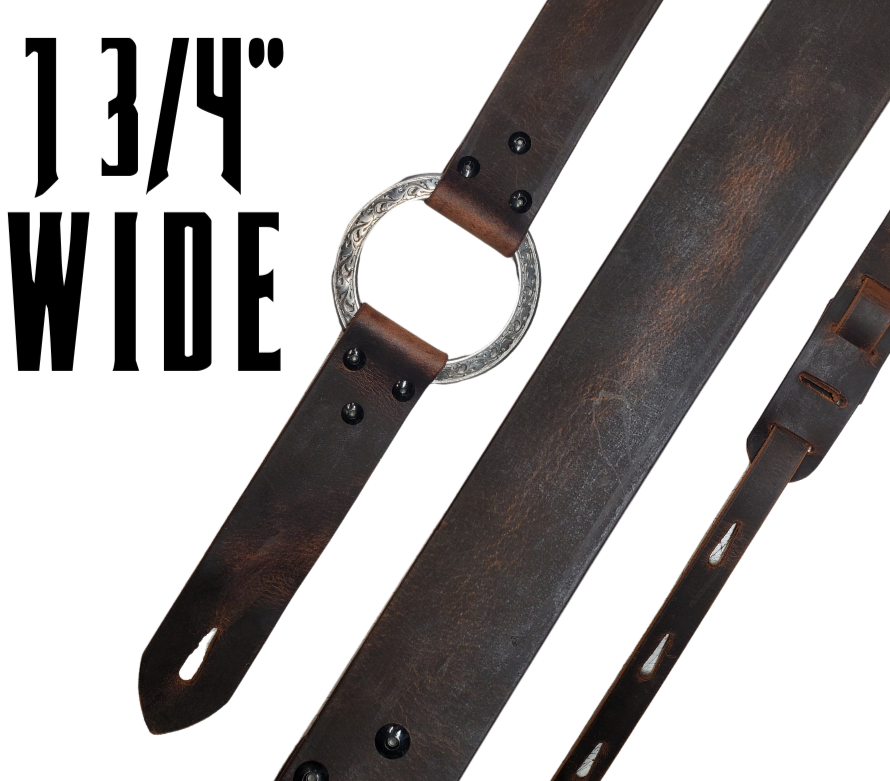 Great Musicians, Singers and great songs have been a staple for years in Nashville. Be on your way starting your journey with this  Vintage styled 1 3/4" "main Body of the Guitar strap is approx. 1/8" thick with a Scroll pattern stainless steel ring. Choose solid Black or Distressed Brown. The classic adjustment style goes from approx. 42" to 56" at it's longest . Made just outside Nashville in our Smyrna, TN. shop. It will need a bit of time to "break in" but will get a great patina over time. 