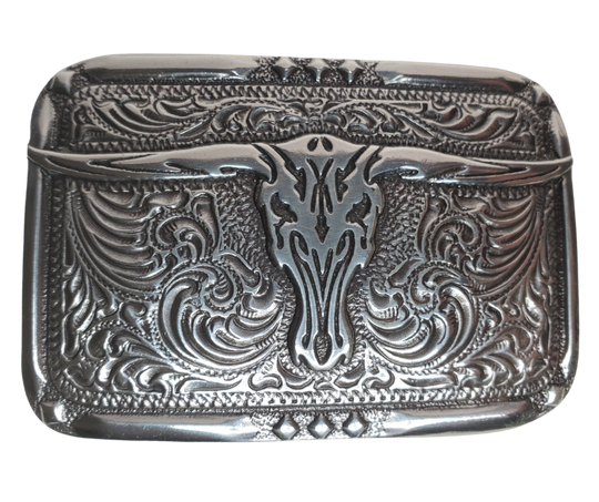 This rectangle buckle by Nocona adds a little southwestern flair with a Longhorn in the center. It stands out with its antique silver color and classic scroll design. Measuring 2" tall, 3" wide and fitting belts up to 1 1/2", this little beauty's available in our Smyrna, TN shop (just outside Nashville) and online! Imported.