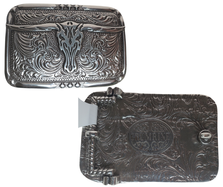 This rectangle buckle by Nocona adds a little southwestern flair with a Longhorn in the center. It stands out with its antique silver color and classic scroll design. Measuring 2" tall, 3" wide and fitting belts up to 1 1/2", this little beauty's available in our Smyrna, TN shop (just outside Nashville) and online! Imported.