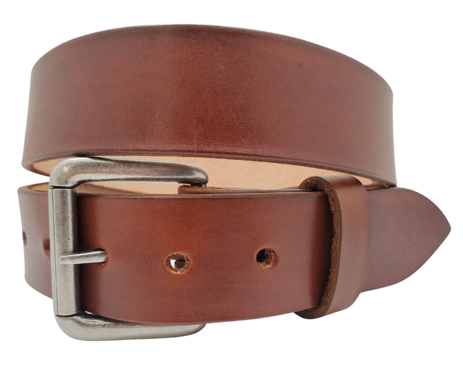 Great for The Office! This real Veg-Tan leather belt starts with a hand dyed 9-10oz (1/8"ish) leather belt strip. Comes with an Antique colored buckle that is snapped in for easy removal. It is handmade in our Smyrna, TN shop, which is located just outside of Nashville.