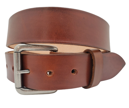 Great for The Office! This real Veg-Tan leather belt starts with a hand dyed 9-10oz (1/8"ish) leather belt strip. Comes with an Antique colored buckle that is snapped in for easy removal. It is handmade in our Smyrna, TN shop, which is located just outside of Nashville.