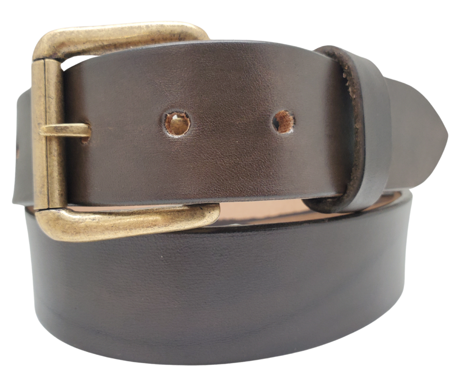 Great for The Office! This real Veg-Tan leather belt starts with a hand dyed 9-10oz (1/8"ish) leather belt strip. Comes with an Antique colored buckle that is snapped in for easy removal. It is handmade in our Smyrna, TN shop, which is located just outside of Nashville.