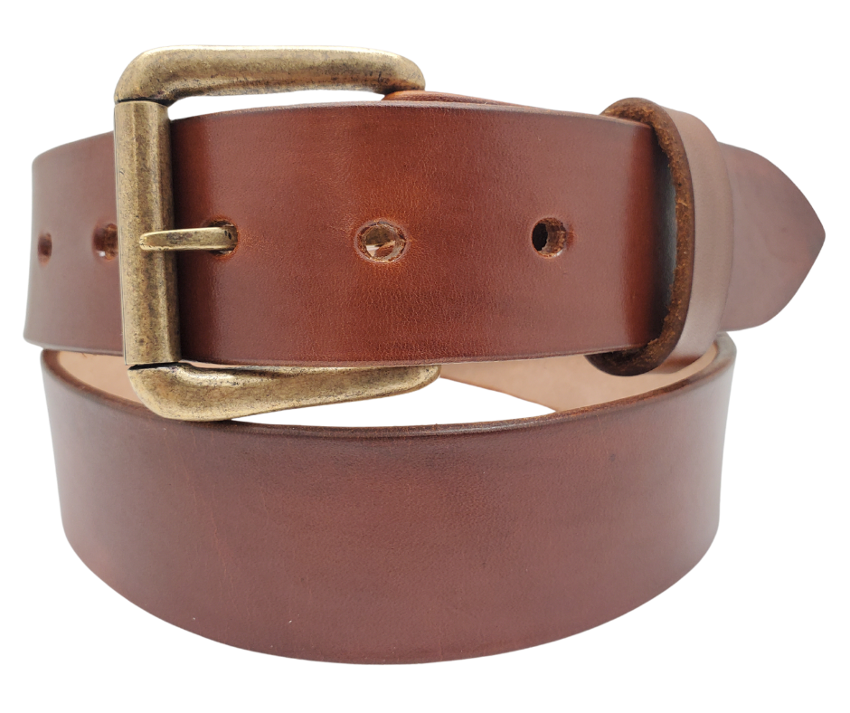 Great for The Office! This real Veg-Tan leather belt starts with a hand dyed 9-10oz (1/8"ish) leather belt strip. Comes with an Antique colored buckle that is snapped in for easy removal. It is handmade in our Smyrna, TN shop, which is located just outside of Nashville.