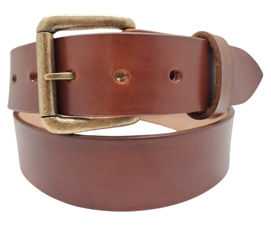 Great for The Office! This real Veg-Tan leather belt starts with a hand dyed 9-10oz (1/8"ish) leather belt strip. Comes with an Antique colored buckle that is snapped in for easy removal. It is handmade in our Smyrna, TN shop, which is located just outside of Nashville.