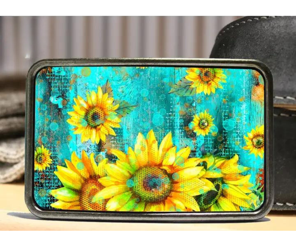 The Raining Daisies is one of most unique belt buckles that are completely metal (image area too) and are made to be durable and lasting! Lots of details in the image and slightly smaller than most of our buckle selection. Available at our Smyrna, TN shop a short ride from downtown Nashville.

Belt Buckle Measures: -3"x2"
Fits any snap belt up to 1 1/2"
Listing is for the belt buckle only &amp; does not include a belt strap.