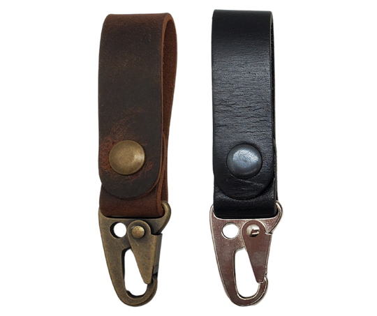 Keep track of your important keys with ease using this leather belt key holder. In today's fast-paced world, it's important to have one less thing to worry about. It can be attached to your belt or bag, making it convenient for your daily routine. Handcrafted in our Smyrna, TN shop, just outside of Nashville, TN.