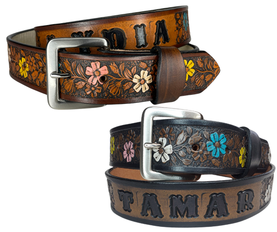 "The Beulah Land" is a handmade real VEGTAN belt made from a single strip of cowhide shoulder leather that is 8-10 oz. or approx. 1/8" thick. It has hand burnished (smoothed) edges and summer flowers embossed on the surface and with most HAND PAINTED in Pink, White, Yellow and Turquoise. The antique nickel plated solid brass buckle is snapped in place with heavy snaps.  This belt is made just outside Nashville in Smyrna, TN.