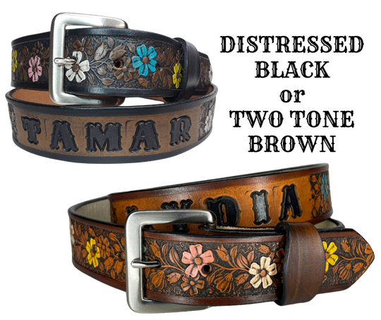 "The Beulah Land" is a handmade real VEGTAN belt made from a single strip of cowhide shoulder leather that is 8-10 oz. or approx. 1/8" thick. It has hand burnished (smoothed) edges and summer flowers embossed on the surface and with most HAND PAINTED in Pink, White, Yellow and Turquoise. The antique nickel plated solid brass buckle is snapped in place with heavy snaps.  This belt is made just outside Nashville in Smyrna, TN.