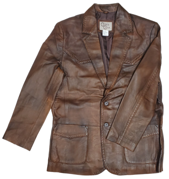 The Cassidy is a Western influenced designed men's blazer jacket is crafted with buttery soft leather, featuring buckstitching around the yoke's and down the sleeves. Boot style stitching on the back panel making this the perfect match for your western style. It features two convenient pockets, and is available in stock at our Smyrna TN shop just a short drive from Nashville. This jacket offers an elegant and sophisticated style that is sure to make a statement.&nbsp;Sizes S-3XL.