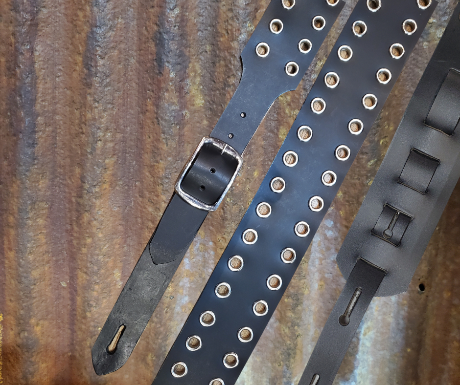 Studs and Eyelets like Marshalls have have been staple for years in Rock music!  "This 2" wide Guitar Strap is a nod to that classic influence. It's made from Pebbled Veg-Tan Cowhide and after some gig's it'll look like you bought in a Vintage shop. The classic adjustment style goes from approx. 42" to 56" at it's longest . Made just outside Nashville in our Smyrna, TN. shop. It will need a bit of time to "break in" but will get a great patina over time.  