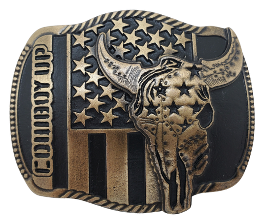 The "Braxton" Belt Buckle is a brass colored oval featuring a Buffalo Skull and a Patriotic USA flag, representing the well-known Rodeo term, "COWBOY UP." It is designed to fit a Standard 1.5 belt and measures approximately 4" x 3". Come visit our shop just outside Nashville in Smyrna, TN to get yours today!