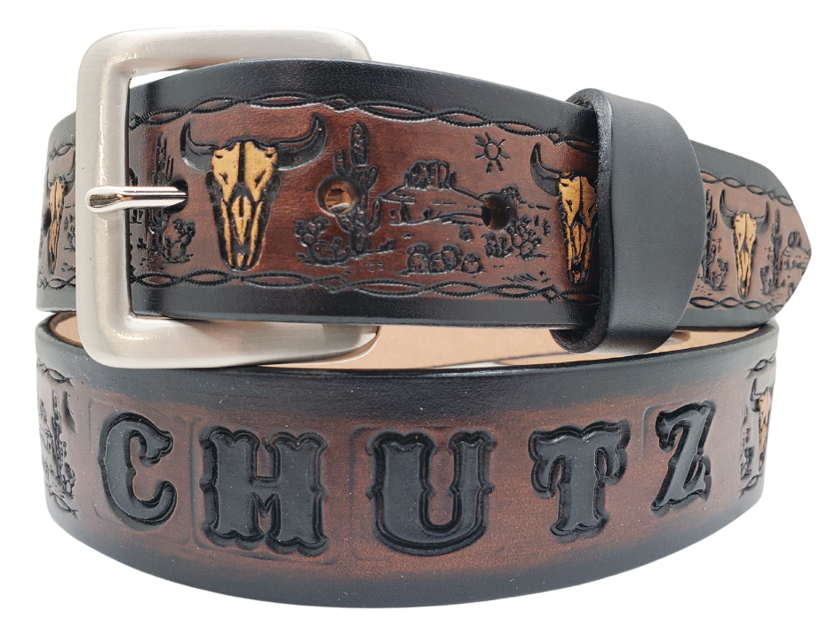 Unleash your western inner self with The "Buffalo Trails" Name Belt. Each belt features a unique hand-stained strip of vegetable tanned leather, adorned with a bold and classic Western pattern. The antique nickel finish solid brass buckle can be effortlessly swapped out. Crafted by hand at our Smyrna, Tennessee shop, just a stone's throw away from Nashville.