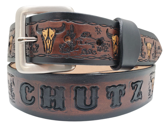 Unleash your western inner self with The "Buffalo Trails" Name Belt. Each belt features a unique hand-stained strip of vegetable tanned leather, adorned with a bold and classic Western pattern. The antique nickel finish solid brass buckle can be effortlessly swapped out. Crafted by hand at our Smyrna, Tennessee shop, just a stone's throw away from Nashville.