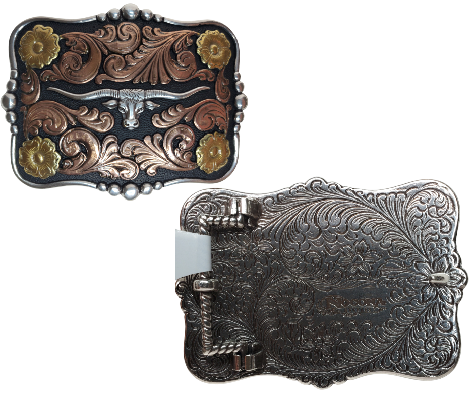 Longhorns embody the spirit of the West. Pay homage to an iconic breed with the "Butler Longhorn" Belt Buckle! Its squared shape, copper and brass accents, and bold black background make the scroll design really stand out! At 2 1/2" x 3 1/2", this buckle is ready to take a risk and add some western to your wardrobe. Get yours online or in-person at our Smyrna, TN shop outside of Nashville! Imported