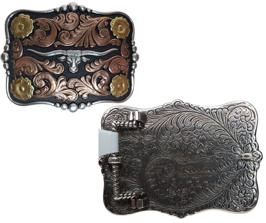 Longhorns embody the spirit of the West. Pay homage to an iconic breed with the "Butler Longhorn" Belt Buckle! Its squared shape, copper and brass accents, and bold black background make the scroll design really stand out! At 2 1/2" x 3 1/2", this buckle is ready to take a risk and add some western to your wardrobe. Get yours online or in-person at our Smyrna, TN shop outside of Nashville! Imported