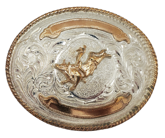 For the Budget minded Winner. It's approx. 3" x 4" size will fit up to a 1 1/2" belt strap. It's plated nickel and gold tone looks just like a real Trophy buckles that all Rodeo stars win. Imported from Mexico. In stock at our Smyrna, TN shop.