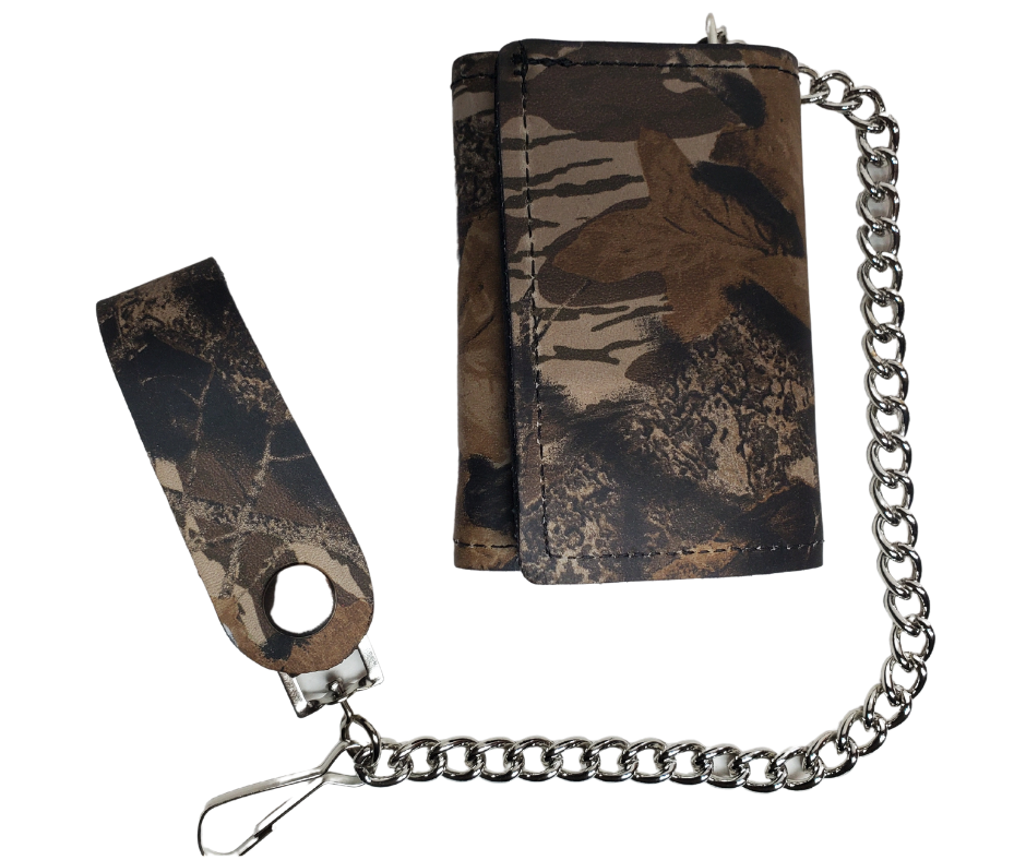 Camo pattern all leather Tri-fold Chain Wallet.  1 Cash Slot for all your important stash, 3 card slots and 1 underneath the middle slot. It's USA made and Buckle and Hide approved. Approx. 3"x 4" folded. 2 snap closure. Complete with an 12" chrome plated chain including leather belt loop. Available in our Smyrna, TN shop a short drive from downtown Nashville. Like most wallets over stuffing will limit the time of use. Colors may vary from picture. 