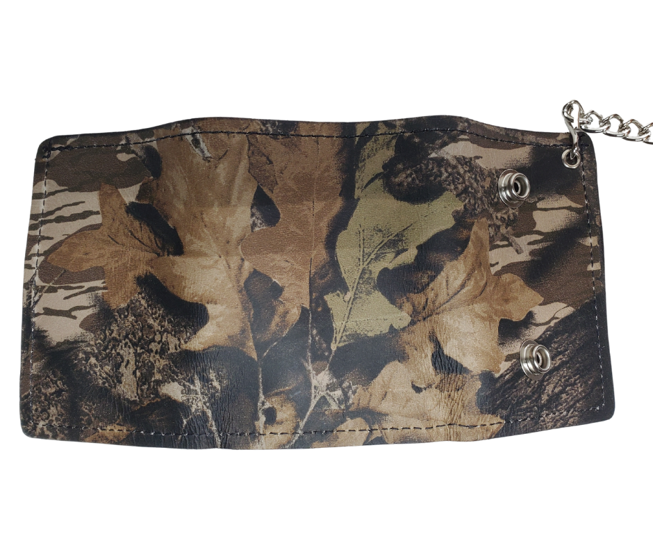 Camo pattern all leather Tri-fold Chain Wallet.  1 Cash Slot for all your important stash, 3 card slots and 1 underneath the middle slot. It's USA made and Buckle and Hide approved. Approx. 3"x 4" folded. 2 snap closure. Complete with an 12" chrome plated chain including leather belt loop. Available in our Smyrna, TN shop a short drive from downtown Nashville. Like most wallets over stuffing will limit the time of use. Colors may vary from picture. 