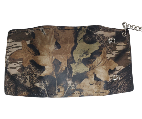 Camo pattern all leather Tri-fold Chain Wallet.  1 Cash Slot for all your important stash, 3 card slots and 1 underneath the middle slot. It's USA made and Buckle and Hide approved. Approx. 3"x 4" folded. 2 snap closure. Complete with an 12" chrome plated chain including leather belt loop. Available in our Smyrna, TN shop a short drive from downtown Nashville. Like most wallets over stuffing will limit the time of use. Colors may vary from picture. 