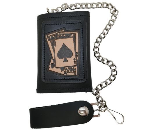 <span>Spade card hand pattern Leather Patch all leather Tri-fold Chain Wallet. 1 Cash Slot for all your important stash, 3 card slots and 1 underneath the middle slot. It's</span><em data-mce-fragment="1"><strong data-mce-fragment="1">&nbsp;USA made&nbsp;</strong></em><span>and Buckle and Hide approved. Approx. 3"x 4" folded. 2 snap closure. Complete with an 12" chrome plated chain including leather belt loop. Available in our Smyrna, TN shop a short drive from downtown Nashville.</span>