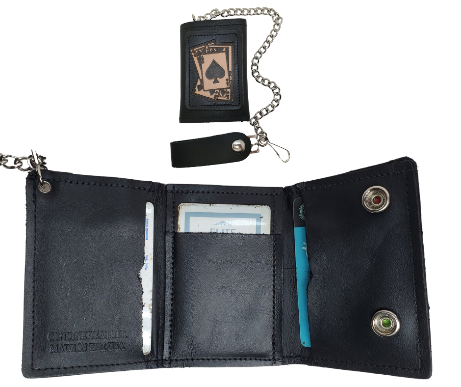 <span>Spade card hand pattern Leather Patch all leather Tri-fold Chain Wallet. 1 Cash Slot for all your important stash, 3 card slots and 1 underneath the middle slot. It's</span><em data-mce-fragment="1"><strong data-mce-fragment="1">&nbsp;USA made&nbsp;</strong></em><span>and Buckle and Hide approved. Approx. 3"x 4" folded. 2 snap closure. Complete with an 12" chrome plated chain including leather belt loop. Available in our Smyrna, TN shop a short drive from downtown Nashville.</span>