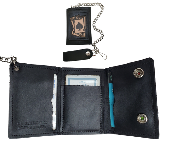 <span>Spade card hand pattern Leather Patch all leather Tri-fold Chain Wallet. 1 Cash Slot for all your important stash, 3 card slots and 1 underneath the middle slot. It's</span><em data-mce-fragment="1"><strong data-mce-fragment="1">&nbsp;USA made&nbsp;</strong></em><span>and Buckle and Hide approved. Approx. 3"x 4" folded. 2 snap closure. Complete with an 12" chrome plated chain including leather belt loop. Available in our Smyrna, TN shop a short drive from downtown Nashville.</span>