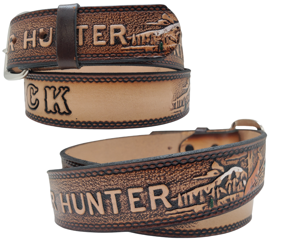 This Buck Fever all leather Name belt features a Deer Hunting pattern in an antiqued finish with a 1 1/2" width. It is crafted from full grain veg-tanned cowhide, with smooth burnished painted edges and a nickel-plated buckle.&nbsp;For customizing, simply type your desired name or No Name in the "Type Name Here" section, the buckle can be easily interchanged as well. This product is in stock at our Smyrna, TN shop.