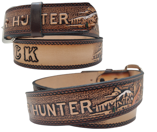 This Buck Fever all leather Name belt features a Deer Hunting pattern in an antiqued finish with a 1 1/2" width. It is crafted from full grain veg-tanned cowhide, with smooth burnished painted edges and a nickel-plated buckle.&nbsp;For customizing, simply type your desired name or No Name in the "Type Name Here" section, the buckle can be easily interchanged as well. This product is in stock at our Smyrna, TN shop.