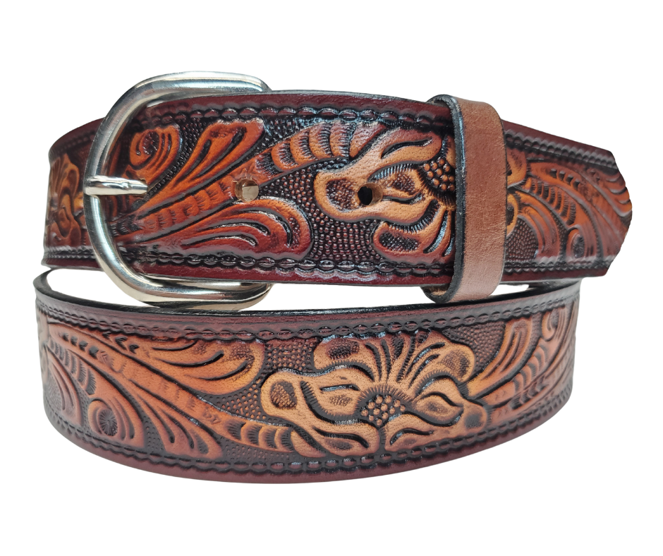 This leather belt has The Classic Western Scroll pattern in a Brown Antiqued finish. Available in a 1 1/2" width. Full grain vegetable tanned cowhide, Width 1 1/2" and includes Nickle plated buckle Smooth burnished painted edges. Made in USA! Buckle snaps in place for easy changing if desired. In stock at our Smyrna, TN shop.