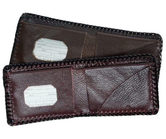 Here's a long time favorite, the Classic laced wallet. These have been around for years and the only wallet some will use. Hand laced with plastic and inside is made from garment leather so they are pliable. The inside layout and color will vary, pictured is the most common inside layout. Choose PLAIN Black or PLAIN Brown. Pick'em up at our Smyrna, Tn shop not to far from Nashville!