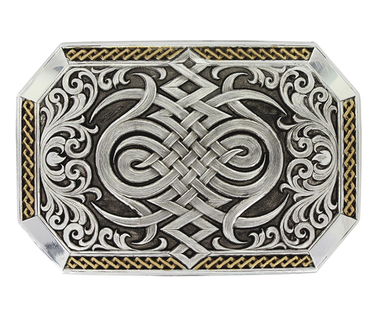 A Western inspired Celtic knot decorates the center of the buckle in a silver finish design, bookended by silver finished sideways heart's flame design with filigree scrollwork coming out from the sides. The silver designs with deeper antiqued background, deep yellow gold finish with a repeating diamond pattern trim on the sides and finished 'corner' bars. Standard 1.5 inch belt swivel and is approx. 2 1/2" x 3 3/4". Available at our Smyrna, TN just a short drive from downtown Nashville. 