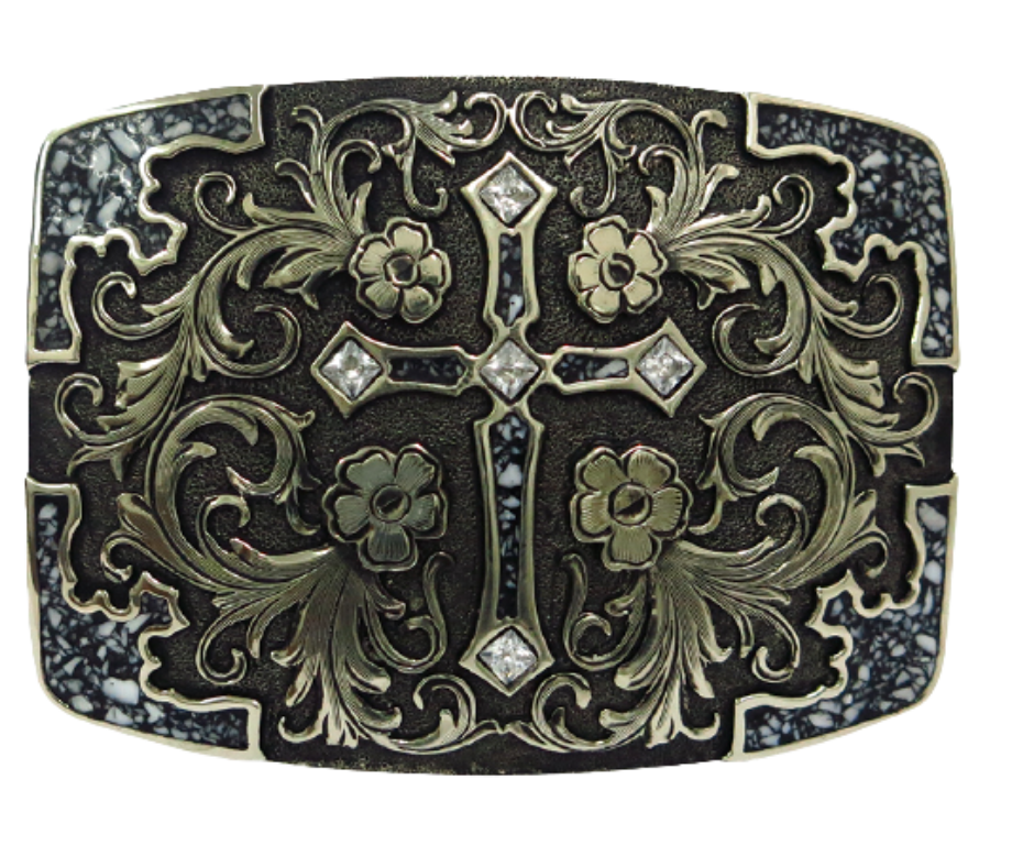 The Cowboy Church buckle is made from German Silver (nickel and brass alloy) or iron metal base. Each piece is punched, cut, soldered, engraved, polished and painted by our talented metal workers. In order to give you the quality and long lasting final product we also plate each piece with copper, nickel and silver.  Finally each piece is covered with a heat sealed lacquer to ensure the piece's long lasting qualities. Available at our Smyrna, TN shop just outside of Nashville.