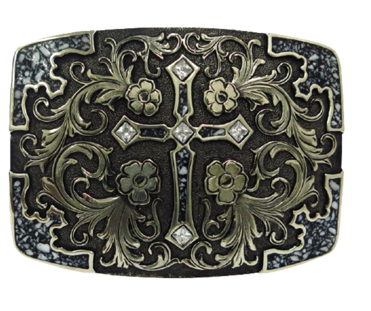 The Cowboy Church buckle is made from German Silver (nickel and brass alloy) or iron metal base. Each piece is punched, cut, soldered, engraved, polished and painted by our talented metal workers. In order to give you the quality and long lasting final product we also plate each piece with copper, nickel and silver.  Finally each piece is covered with a heat sealed lacquer to ensure the piece's long lasting qualities. Available at our Smyrna, TN shop just outside of Nashville.