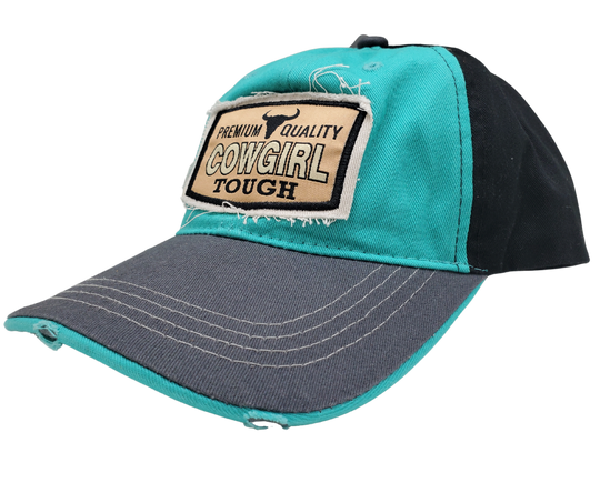 Cowgirl UP! Wear your American Cowgirl Tough Distressed Embroidered Trucker Cap with pride! The Turquoise twill front and Black back feature a Longhorn graphic with a Charcoal stitched bill, plus an adjustable snap strap to perfectly fit any size head. Take a short trip outside Nashville to our Smyrna, TN shop and get yours now!