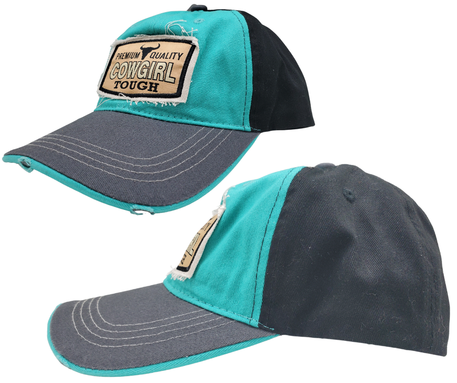 Cowgirl UP! Wear your American Cowgirl Tough Distressed Embroidered Trucker Cap with pride! The Turquoise twill front and Black back feature a Longhorn graphic with a Charcoal stitched bill, plus an adjustable snap strap to perfectly fit any size head. Take a short trip outside Nashville to our Smyrna, TN shop and get yours now!