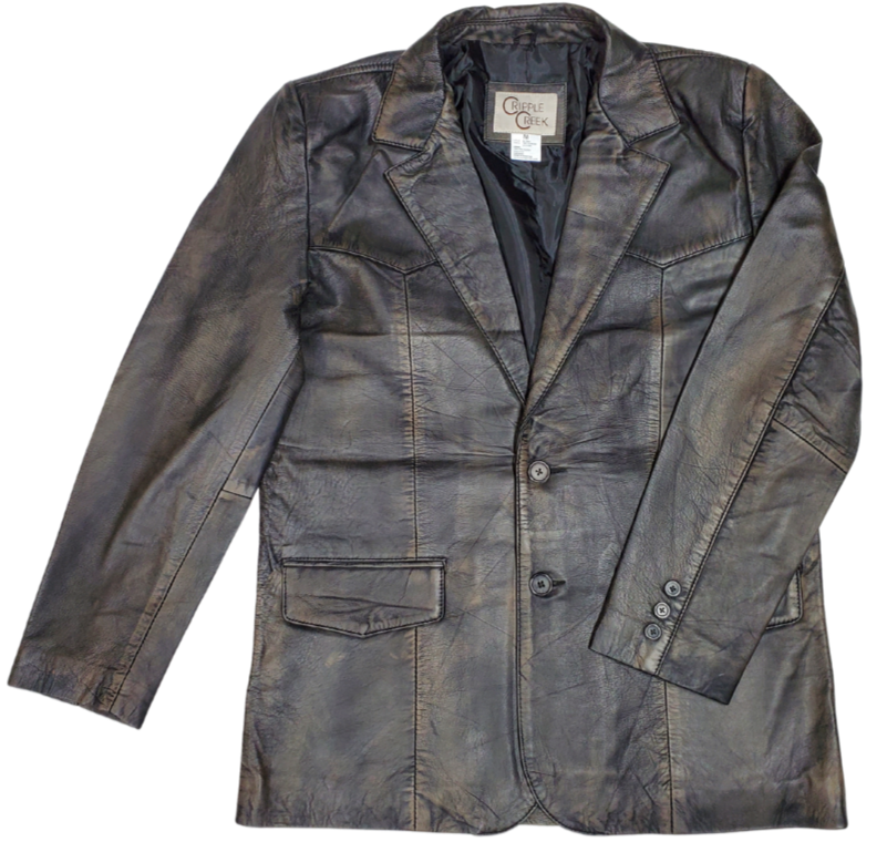 The "Carson is a butter-soft Distressed Brown Leather blazer Jacket for men is delicately distressed in a rich brown hue. Its two pockets are thoughtfully designed for convenient storage, and it is proudly presented in-store at our Smyrna TN shop, located in close proximity to Nashville. Offering luxury and refinement, this piece is sure to leave an unforgettable impression.&nbsp;Sizes S-3XL.