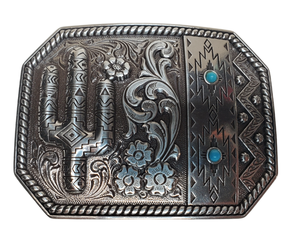 Experience the warmth of a Desert Skies Night with this classic western belt buckle. Featuring a combination of traditional rope edge scroll patterns and Southwest designs, adorned with two small Turquoise stones, this piece will transport you to a beautiful place. Don't miss out on the opportunity to add this unique item to your collection, whether you visit our store in Smyrna, TN or shop online. Imported.