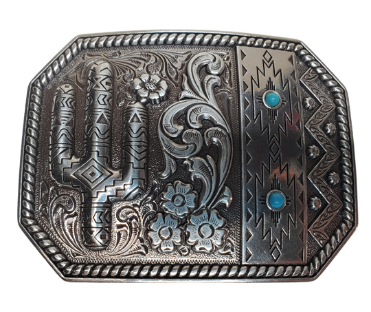 Experience the warmth of a Desert Skies Night with this classic western belt buckle. Featuring a combination of traditional rope edge scroll patterns and Southwest designs, adorned with two small Turquoise stones, this piece will transport you to a beautiful place. Don't miss out on the opportunity to add this unique item to your collection, whether you visit our store in Smyrna, TN or shop online. Imported.