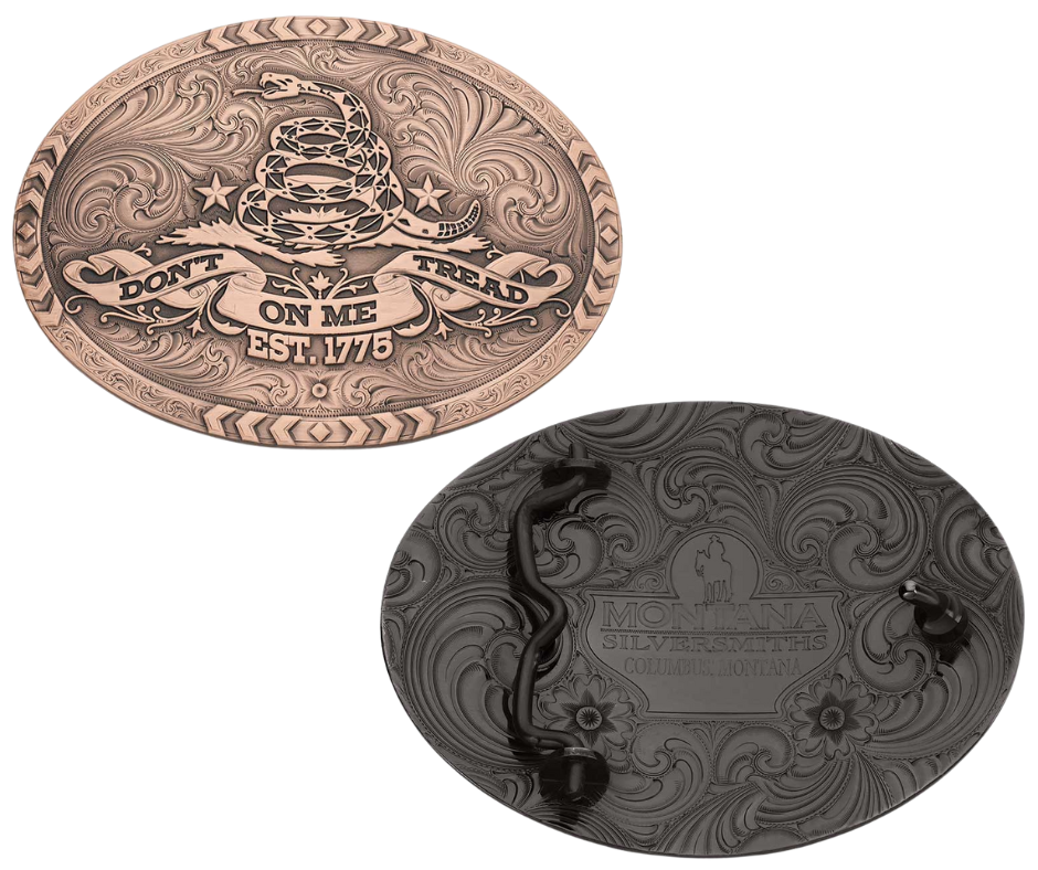 The 1776 Declaration is a Vintage Bronze Gadsden Belt Buckle. This oval buckle features a bronze tone finish. The words "Don’t Tread on Me" are featured prominently on curling ribbon at the bottom of the buckle. The Gadsden rattle snake sits ready to strike in the center of the buckle for a bold look. Chevron designs border the top, bottom, and sides giving the buckle a militant feel. Approx 4"x3" Standard 1.5 inch belt swivel. Get yours at our local Smyrna, TN not far from Nashville.