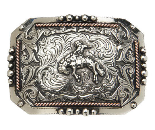 If your in rodeo you know a drop makes for a more difficult ride! This buckle is full on Western with accents of copper and a partially beaded edge, measuring 4" in width and 2 7/8" in height to fit belts up to 1 3/4" wide. Visit our shop in Smyrna, TN, conveniently located near downtown Nashville, to discover this and other one-of-a-kind belt buckles.