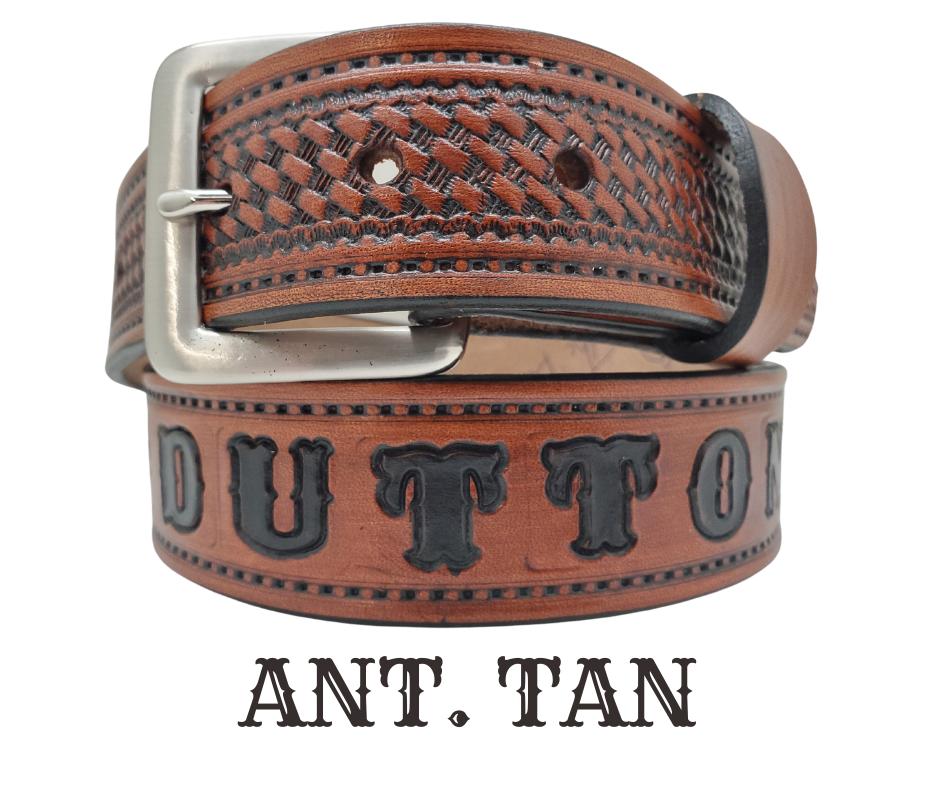 New to our line "The Dutton" Name Leather Belt - a personalized accessory made in Smyrna, TN. This timeless piece features a classic basket weave embossed stitch border and an interchangeable solid brass buckle for convenience and quality. Elevate any outfit with ease.