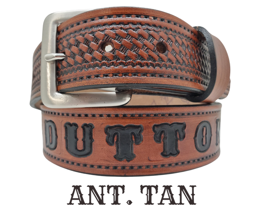 New to our line "The Dutton" Name Leather Belt - a personalized accessory made in Smyrna, TN. This timeless piece features a classic basket weave embossed stitch border and an interchangeable solid brass buckle for convenience and quality. Elevate any outfit with ease.